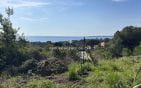 À VENDRE TERRAIN CONSTRUCTIBLE VUE MER Min 0